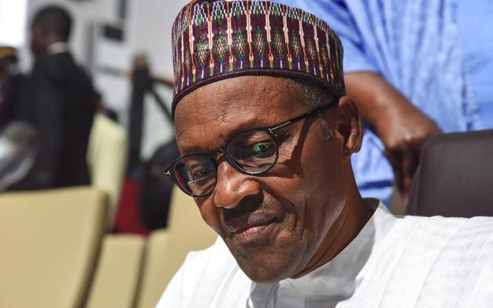 Nigerian president Muhammadu Buhari looks on during the African Union summit at the palais des Congres in Niamey, on July 7, 2019. 