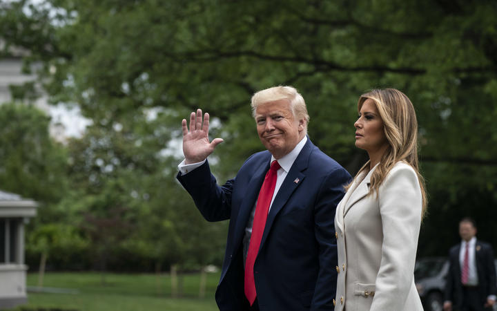 US President Donald Trump and first lady Melania Trump arrive to the South Lawn of the White House after a trip to Baltimore, Marylandm marking Memorial Day on May 25, 2020 in Washington, DC. 