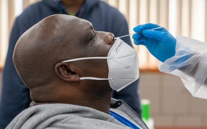 NEW YORK, NY - OCTOBER 30: Michael Stanley an employee for the MTA, is administered a COVID-19 test on October 30, 2020 in New York City. 