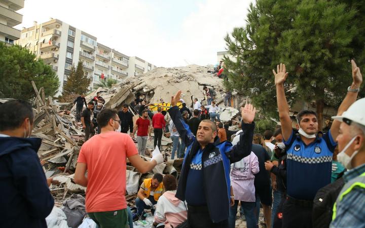 IZMIR, TURKEY - OCTOBER 30: Search and rescue works are being conducted at debris of a building in Bayrakli district after a magnitude 6.6 quake shook Turkey's Aegean Sea coast, in Izmir, Turkey on October 30, 2020. 