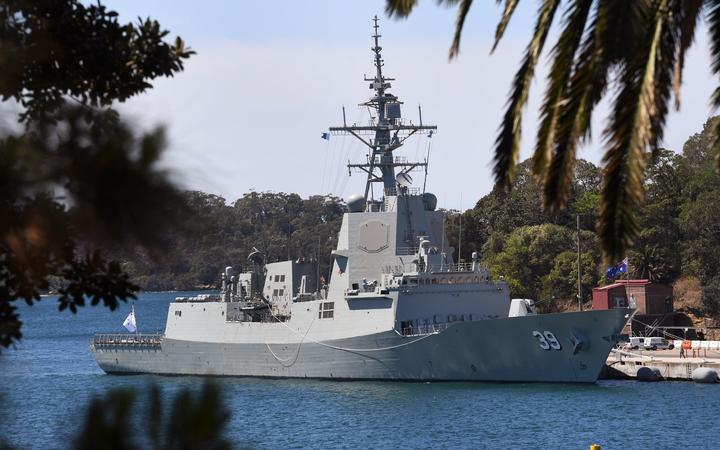 Australia's warship the HMAS Hobart, a Hobart-class air warfare destroyer, is moored at the Garden Island naval base in Sydney on October 12, 2017. 