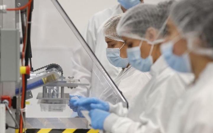 DRAPER, UT - SEPTEMBER 21: Employees at Spectrum Solutions assembles COVID-19 saliva test kits on September 21, 2020 in Draper, Utah. 