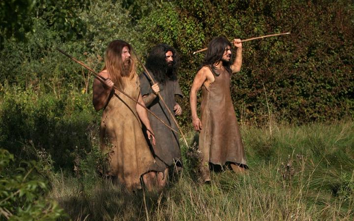 Scene of men hunting with spears in prehistoric times. Image taken from the filming of 'Paris la ville a remonter le temps' written by Carlo de Boutiny and Alain Zenou, directed by Xavier Lefebvre, a Gedeon Programmes production. 