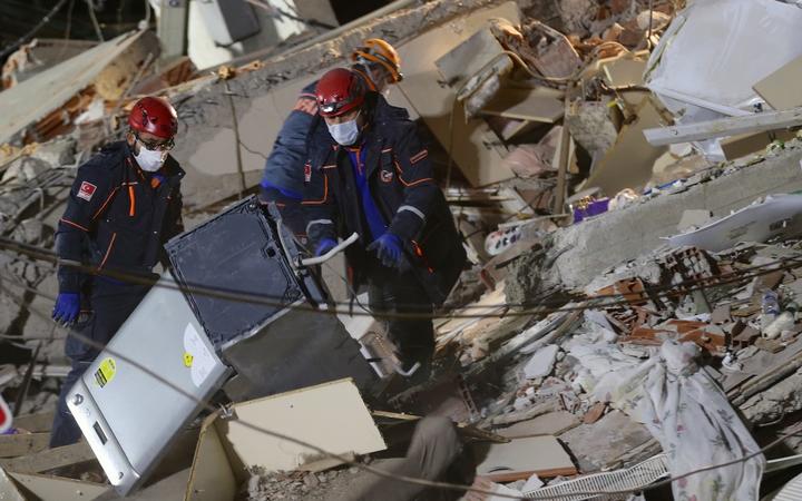 IZMIR, TURKEY - OCTOBER 31: Search and rescue works continue at debris of Doganlar Apartment located in Bayrakli district after a magnitude 6.6 quake shook Turkey's Aegean Sea coast, in Izmir, Turkey on October 31, 2020.