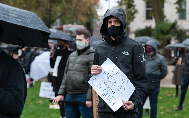 Theatre performers, creatives and technicians gather in Parliament Square to take part in the ‘Survival in the Square' creative demonstration to highlight the plight of live events industry shut down due the Covid-19 pandemic