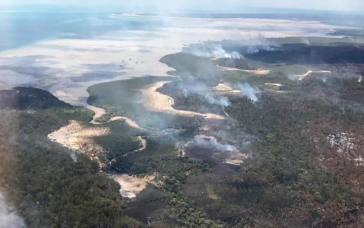 Fire evacuation points on Fraser Island were underwater due to high tides and huge waves, a week after blazes ravaged the island.