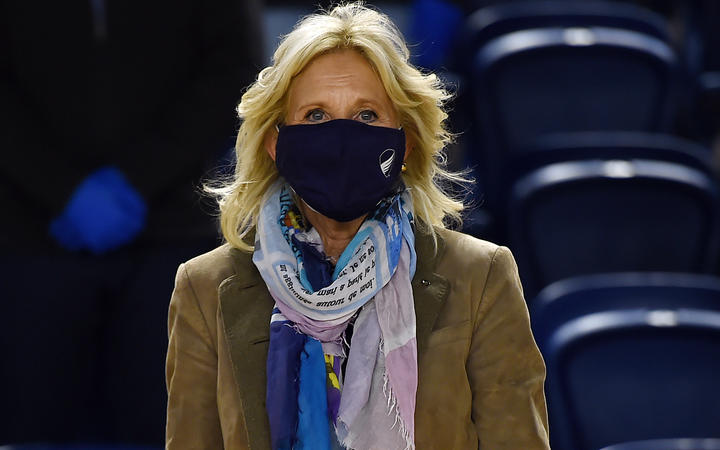 Jill Biden arrives to join Operation Gratitude to assemble care packages for deployed US troops, on December 10, 2020, in Washington, DC. (Photo by Olivier DOULIERY / AFP)