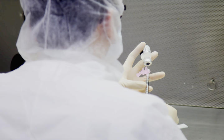 Photo dated December 9, 2020 courtesy of Mount Sinai Health System in New York shows a lab technician during a dry run at Mount Sinai hospital ahead of an expected Pfizer COVID-19 vaccine shipment over the weekend. - 