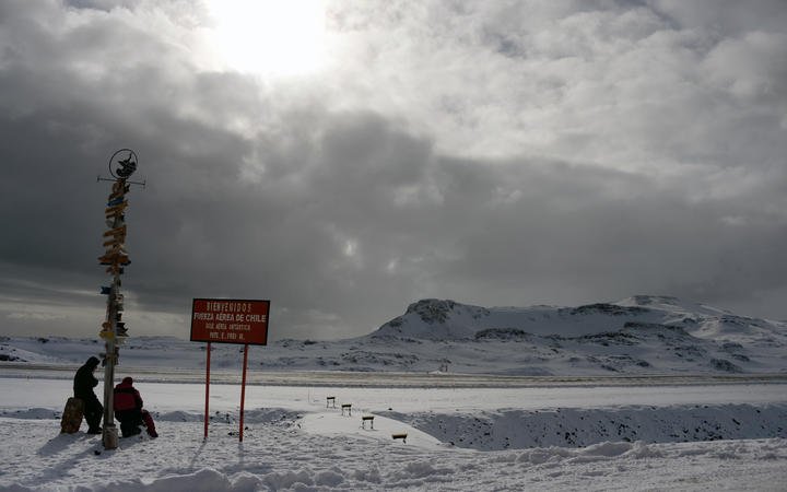 Two Chilean marines take a rest at Chile's military base Presidente Eduardo Frei, in the King George island, in Antarctica, on March 13, 2014. 