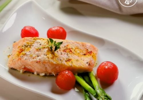 Salmon In Pappiotte With Asparagus Cherry Tomatoes