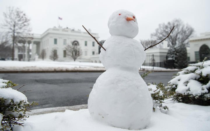 A snowman is seen on the North Lawn of the White House in Washington, DC.
